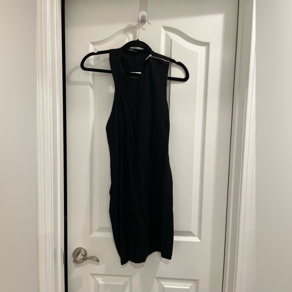 NEW Zara mini-black dress, asymmetrical detail, sleeveless. Size M.
